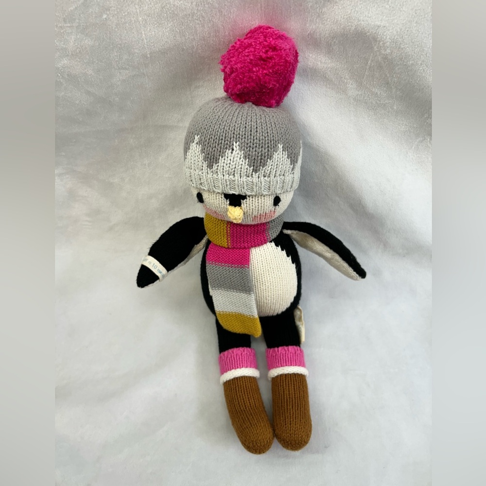 Cuddle + kind Aspen the penguin